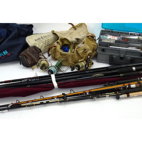 560 - Large selection of sea fishing rods, tackle etc including beach casters, boat rods, reels