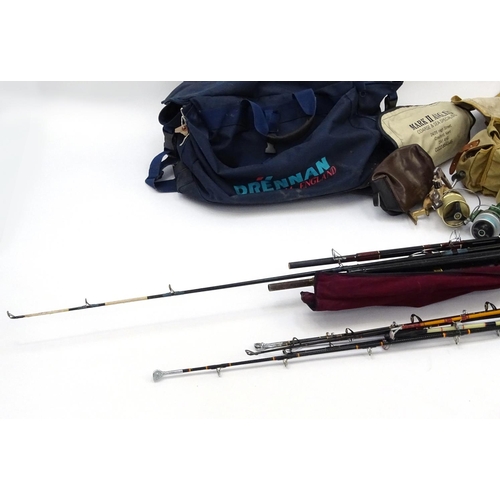 560 - Large selection of sea fishing rods, tackle etc including beach casters, boat rods, reels