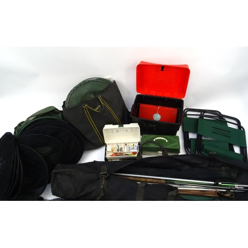 559 - Large selection of fresh water fishing tackle including a holdall full of rods, reels, tackle, nets,... 