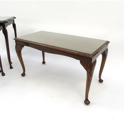 95 - Nest of three mahogany occasional tables and a similar rectangular coffee table