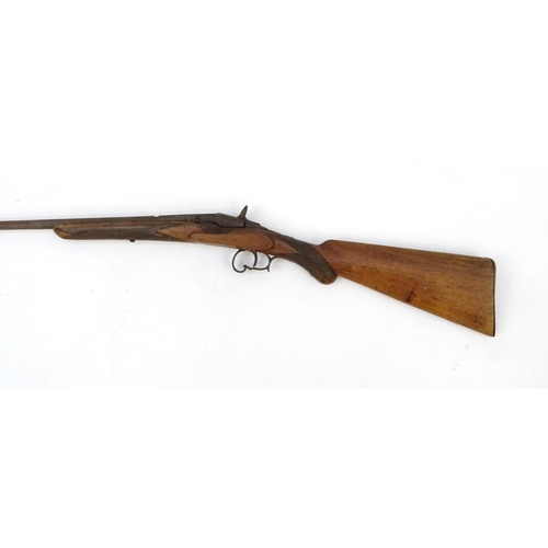 767 - Antique poachers rifle with wooden stock