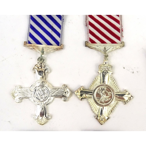 802 - Four Military interest copy medals including the distinguished flying cross