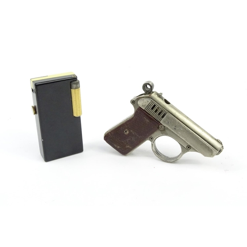 419 - Ronson pistol cigarette lighter and a Bulova clock inlaid lighter