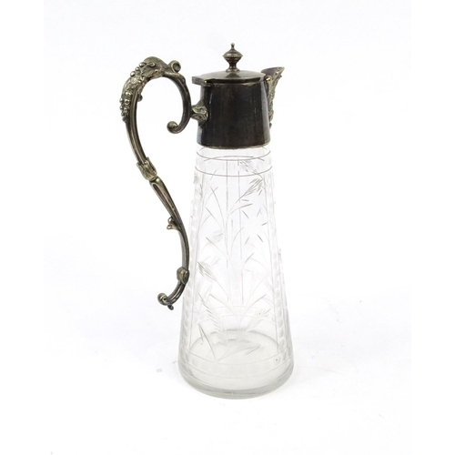 407 - Engraved glass claret jug with silver plated handle and spout