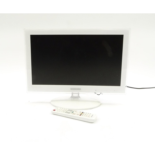 68 - Samsung 22inch LCD television finished in white, with remote control