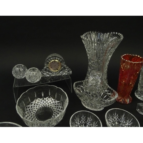 286 - Assorted cut glassware and crystal including a Waterford clock, vases, fruit bowls etc