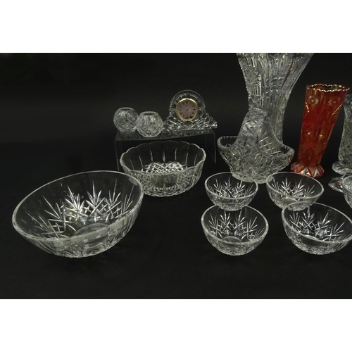 286 - Assorted cut glassware and crystal including a Waterford clock, vases, fruit bowls etc