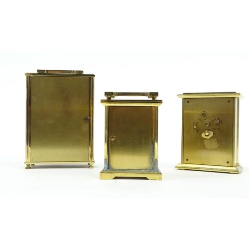 234 - Three brass cased carriage clocks including a Swiza example, the largest 16cm high