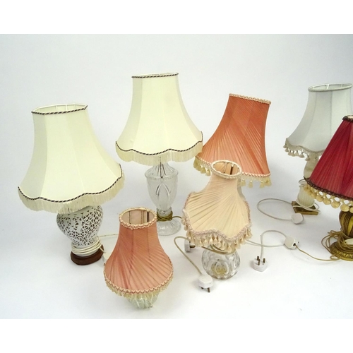 315 - Seven assorted table lamps with shades including glass, porcelain and marble examples