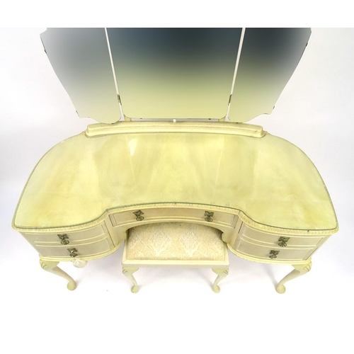 102 - Cream painted bedroom suite comprising kidney shaped dressing table with mirrored back and stool, fi... 