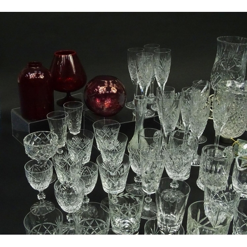 598 - Large selection of mostly cut glass and crystal items including heavily cut glass vases, glasses, tu... 