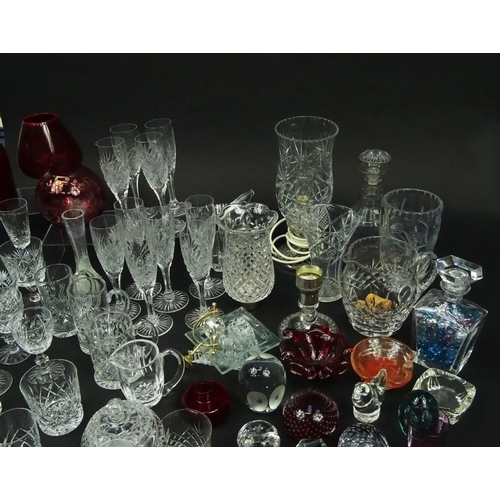 598 - Large selection of mostly cut glass and crystal items including heavily cut glass vases, glasses, tu... 