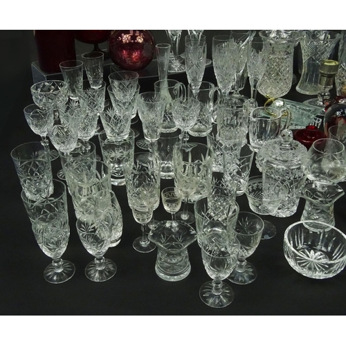 598 - Large selection of mostly cut glass and crystal items including heavily cut glass vases, glasses, tu... 