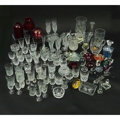 598 - Large selection of mostly cut glass and crystal items including heavily cut glass vases, glasses, tu... 