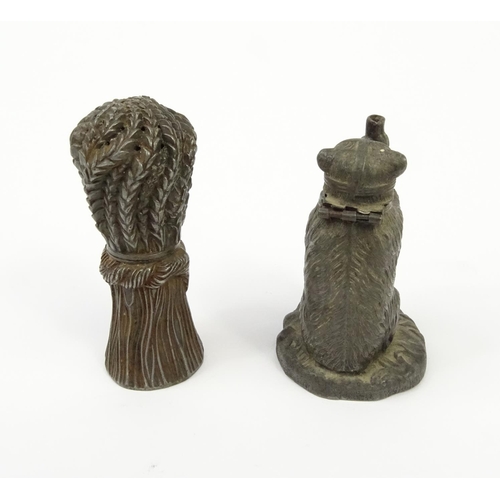 423 - Cast metal wheat sheaf pounce pot and a bear inkwell with hinged head