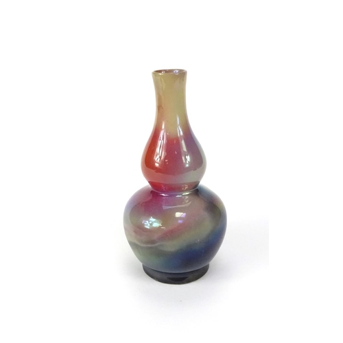 550 - Oriental colourful glazed double gourd vase, 20cm high