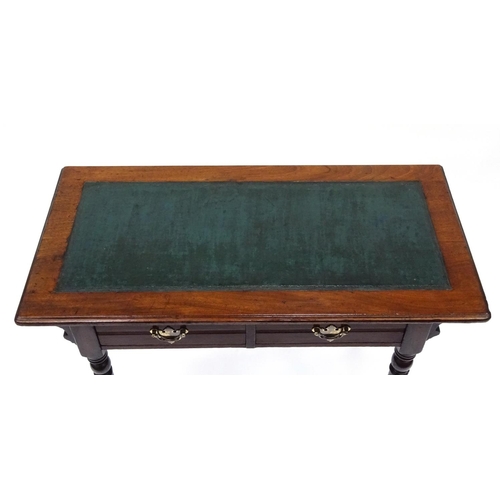 67 - Edwardian walnut writing table with tooled leather insert and two frieze drawers, 71cm high x 91cm w... 