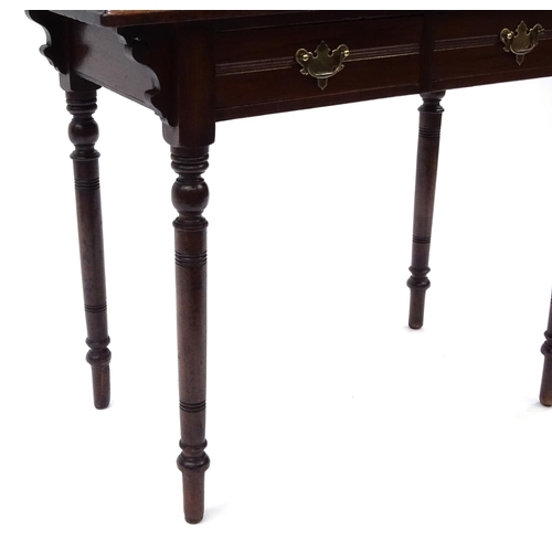 67 - Edwardian walnut writing table with tooled leather insert and two frieze drawers, 71cm high x 91cm w... 