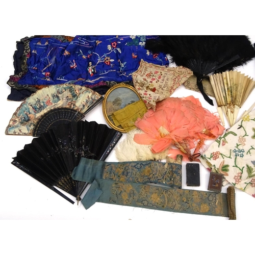 624 - Antique and later materials including a Victorian silk embroidery, fans and Oriental silk embroidery... 