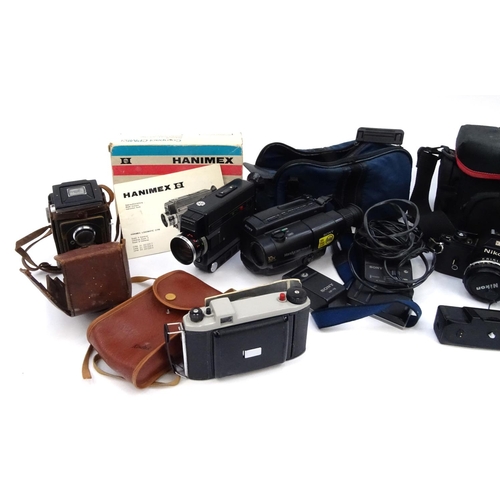 327 - Assorted cameras and accessories including a Zeiss Ikon Compur, Nikon with spare lenses etc