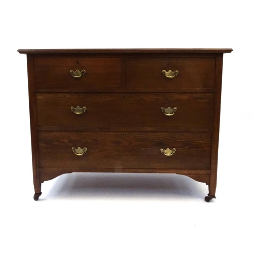 122 - Oak four drawer chest fitted with two short above three long drawers, 82cm high x 106cm wide x 49cm ... 