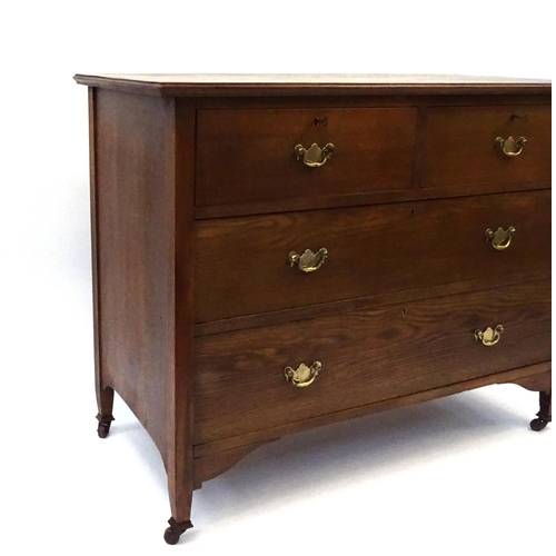 122 - Oak four drawer chest fitted with two short above three long drawers, 82cm high x 106cm wide x 49cm ... 