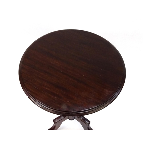 6 - Circular mahogany tripod occasional table, 73cm high x 48cm in diameter