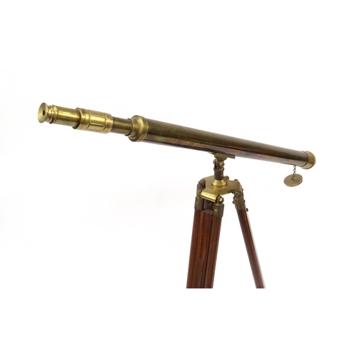 765 - Brass telescope on stand