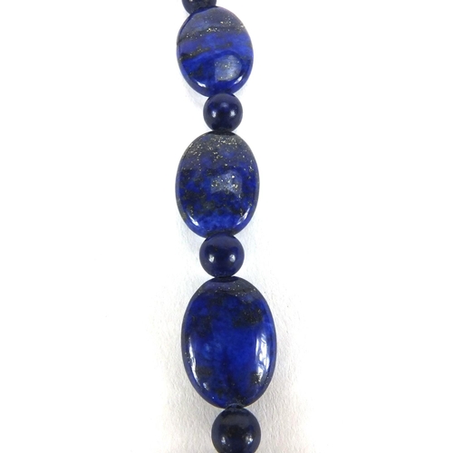 2527 - Silver and lapis lazuli necklace, bracelet and earrings, the necklace 44cm long, approximate weight ... 