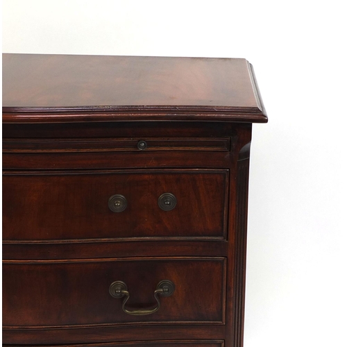 12 - Reproduction mahogany serpentine fronted five drawer chest with brushing slide on bracket feet, 78cm... 