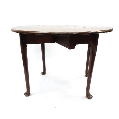 8 - Georgian mahogany oval drop leaf table, 70cm high