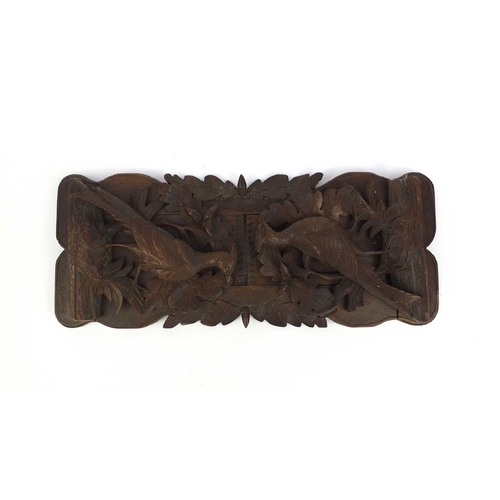 258 - Black forest extending book slide, the fold up ends carved with game, 39cm wide unextended