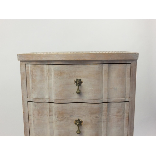 130 - Bleached wooden four drawer chest with mirrored top and brass drop handles, 106cm high x 58cm wide x... 