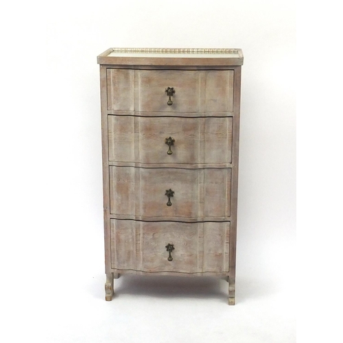 130 - Bleached wooden four drawer chest with mirrored top and brass drop handles, 106cm high x 58cm wide x... 