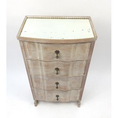 130 - Bleached wooden four drawer chest with mirrored top and brass drop handles, 106cm high x 58cm wide x... 