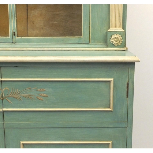 149 - Georgian style green and cream painted bookcase fitted with a pair of glazed doors above two cupboar... 