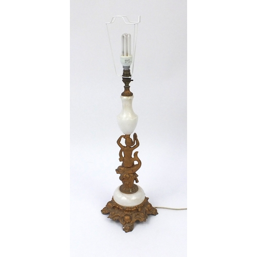 188 - Gilt metal and alabaster table lamp, the column modelled as a female riding a dolphin, 78cm high