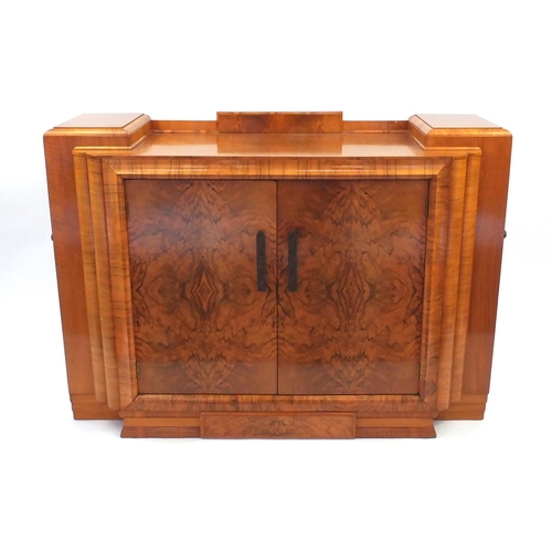 2004 - Art Deco walnut sideboard fitted with a pair of doors and end cupboards, 98cm high, 137cm wide x 49c... 