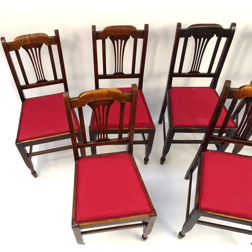 25 - Set of six walnut dining chairs with red upholstered seats