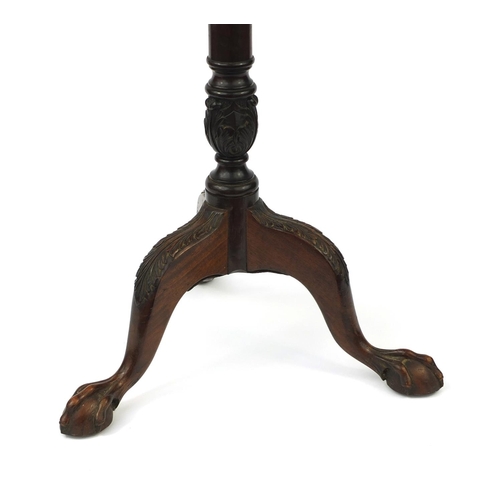 24 - *Description amended 03-06-17* Victorian carved mahogany tripod wine table with shaped top, 64cm hig... 