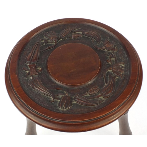 37 - Carved mahogany tripod stool engraved 1906, 32cm high, 29cm in diameter