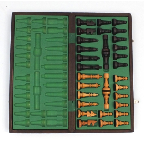 536 - Wooden chess set with folding board case, the largest piece 10cm high