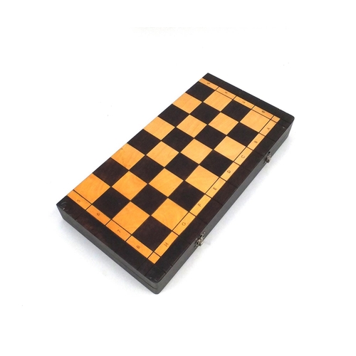 536 - Wooden chess set with folding board case, the largest piece 10cm high