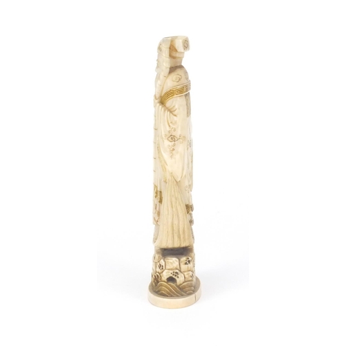 547 - Japanese carved ivory okimno of an elder with a crane, standing upon a tortoise, 17cm high