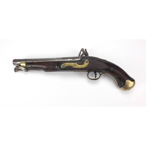 357 - Antique flint lock pistol with brass mounts, engraved Tower, GR emblem and proof marks, initialled T... 