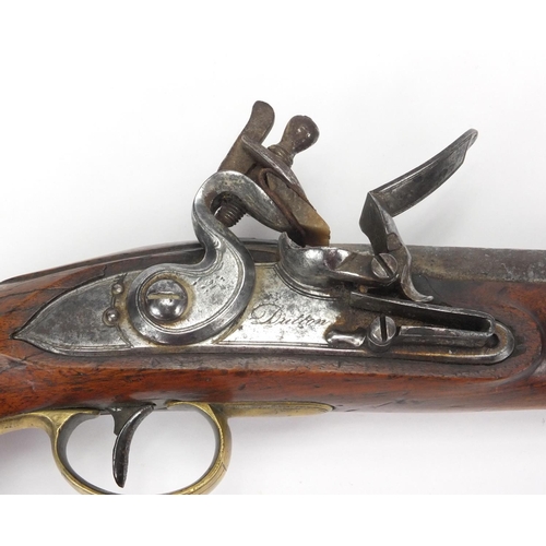 358 - Antique flint lock pistol with brass mounts, engraved Dutton, impressed proof marks, 39cm in length