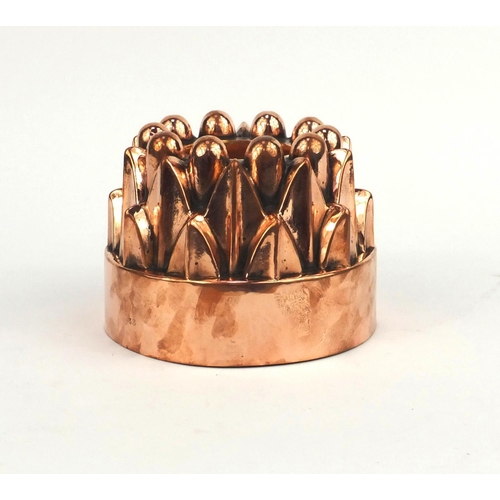 59 - Victorian copper jelly mould numbered 38 around the rim, 10.5cm high x 14cm diameter
