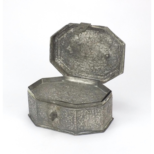 624 - Omani silver coloured metal spice box of hexagonal form, hinged lid opening to reveal a lift out tra... 