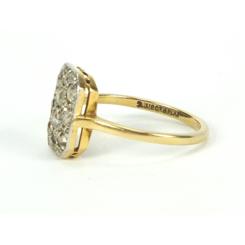 924 - 18ct gold diamond cluster ring set with ten diamonds, size Q, approximate weight 3.9g