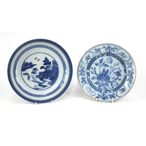 504 - Two Chinese porcelain dishes, one hand painted with a river landscape the other with flowers and emb... 